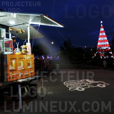 Letrero de camión de comida iluminado por proyección de logotipo