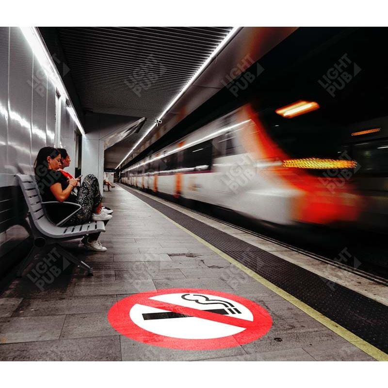 Illuminated sign on the ground no smoking Illuminated sign on the ground no smoking