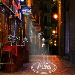 Illuminated logo projection for bar and pub