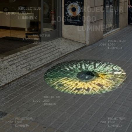 Illuminated logo projection on sidewalk to attract customers