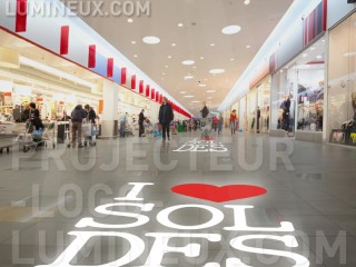 Projection logo magasin
